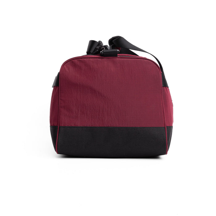 Flatlay 1234 Ripstop Duffle Bag in crimson and black, front view