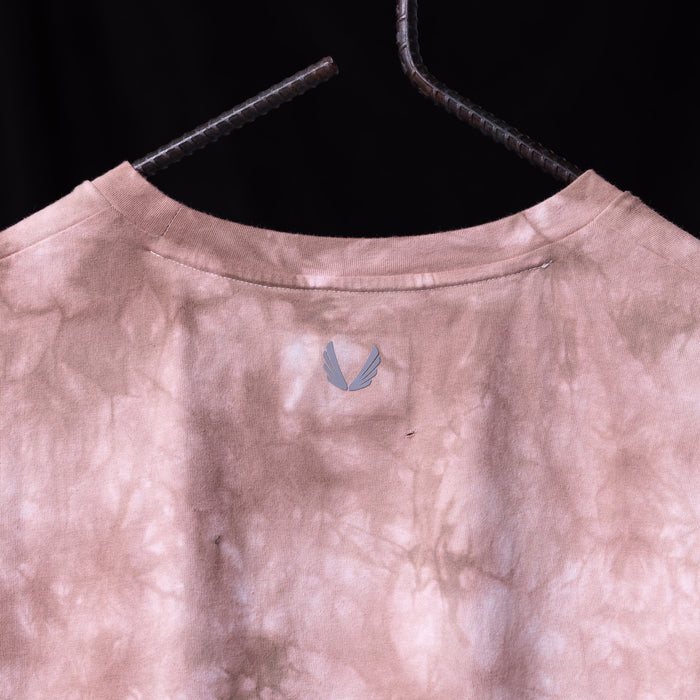 2020 Tie Dye Cutoff Tank in mauve pink, hanging on wooden hanger back view