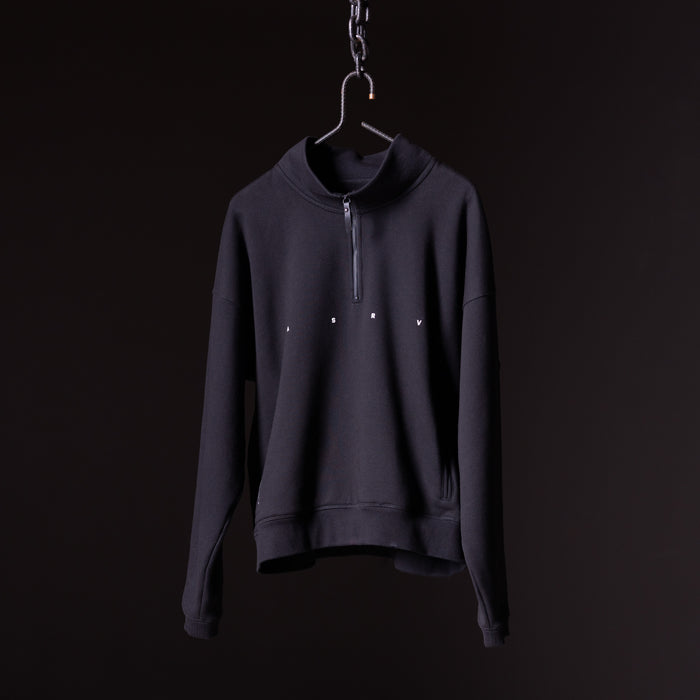 Navy quarter zip sweatshirt on hanger against black background, front view