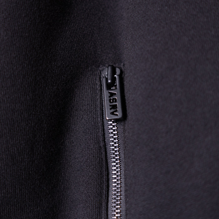 2021 Zip Pocket Quarter Zip closeup of black zipper pull and metal slider detail