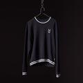 Navy crew neck sweatshirt with white stripe trim on hanger against black background