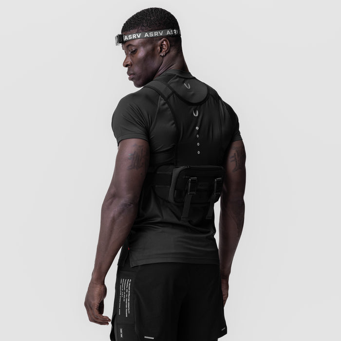 Black monocle headwear worn by model in profile, showcasing ASRV branding and design