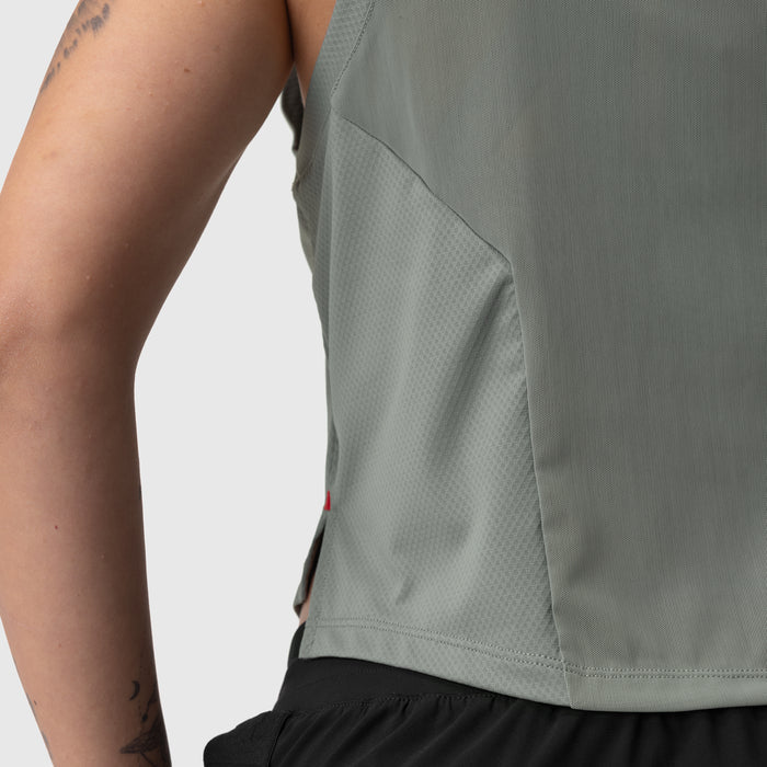 AeroSilver Cropped Training Tank in sage worn by model, side view