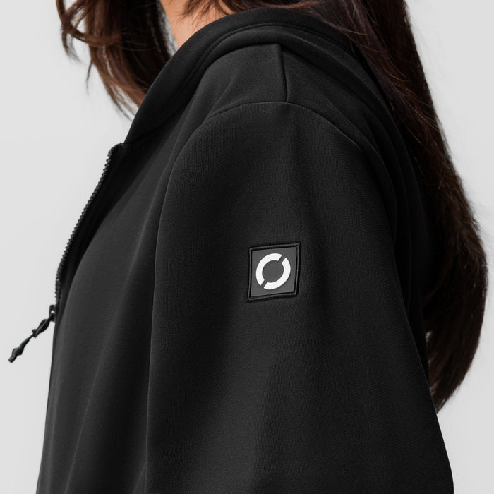 Black ASRV Sorona French-Terry Oversized Zip Hoodie worn by model, side view showing logo patch