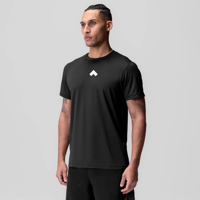 Black ASRV Essential Tee with white logo, worn by model, front view