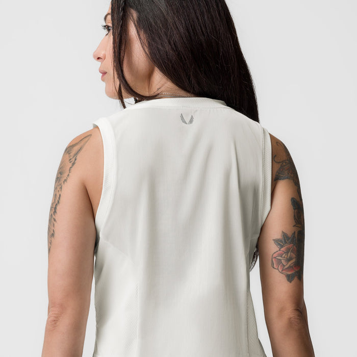 Ivory cream cropped training tank worn by model, back view showing tonal design