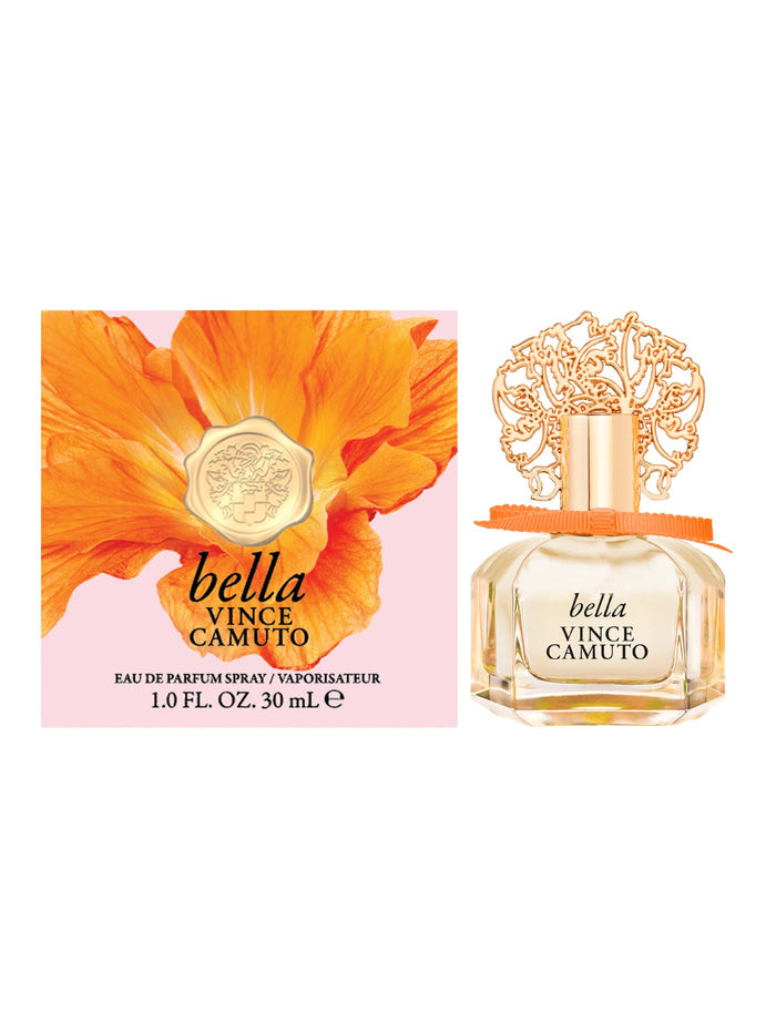 The Bella 1.0 oz Eau de Parfum Spray by Vince Camuto is presented in a perfume bottle adorned with an ornate gold cap and matching branded label. It is displayed beside its box, which features a vibrant orange flower and the corresponding branding. The fragrance blends notes of Italian bergamot and nectarine blossom, and the box indicates a size of 1.0 FL. OZ. (30 mL).