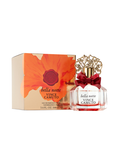 A bottle of Vince Camuto’s Bella Notte 3.4 oz Eau de Parfum Spray, adorned with an ornate gold cap and a red bow, sits beside its matching box decorated with a bold red flower design.