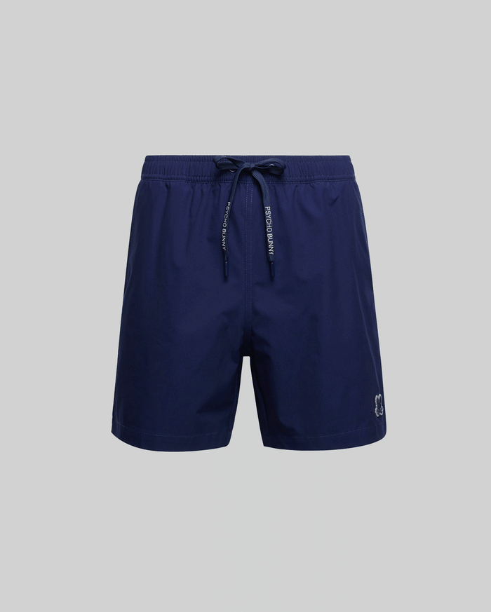 The Psycho Bunny MENS BIG AND TALL SAMOS HYDROCHROMIC SWIM TRUNK (B9W453F200) in navy features an elastic waistband, drawstring ties, mesh lining, and a small embroidered logo on the left leg, shown against a light gray background.