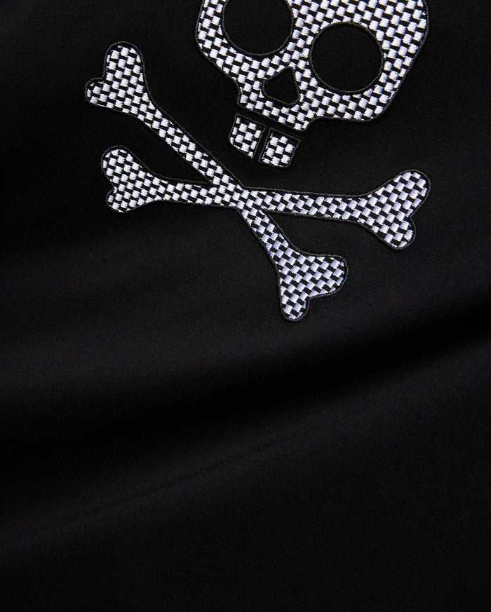Mens Big And Tall Stan Graphic Tee featuring a black jersey fabric with a large, embroidered white and black checkered skull and crossbones graphic on the chest, offering a relaxed fit.