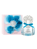 A 3.4 oz bottle of Capri Eau de Parfum Spray by Vince Camuto, adorned with a decorative silver cap and blue ribbon, is displayed beside its pink box featuring a large blue flower and branded detailing—perfectly capturing the essence of its floral fruity fragrance with a sparkling citrus blend.
