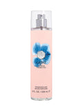 Capri Body Mist 8.0 oz by Vince Camuto comes in a clear spray bottle with a pink label, blue flower graphic, and silver cap. It offers a floral fruity fragrance highlighted by a refreshing citrus blend.
