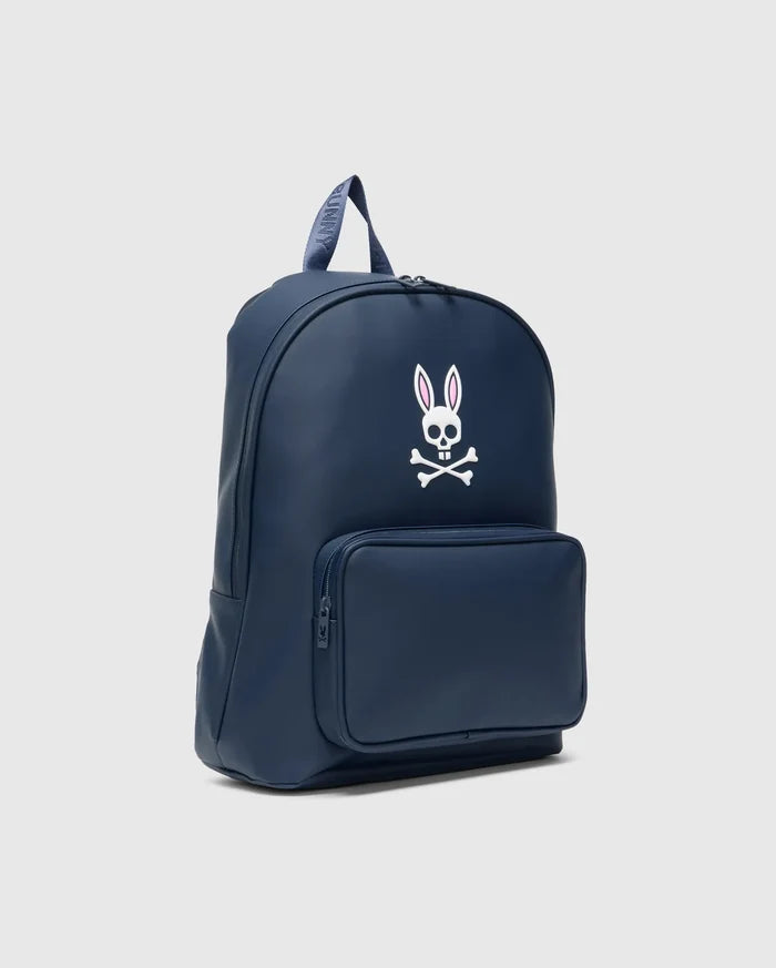Smooth navy blue Classic Bunny Backpack with a prominent white and pink Psycho Bunny skull logo on the front, a zippered pocket, and a top handle featuring repeated BUNNY text.