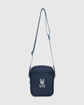 Classic Bunny Messenger Bag in navy, featuring a prominent white and pink Psycho Bunny skull logo on the front, made from smooth, durable fabric.