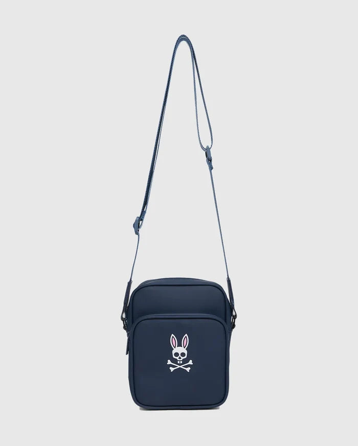 Classic Bunny Messenger Bag in navy, featuring a prominent white and pink Psycho Bunny skull logo on the front, made from smooth, durable fabric.