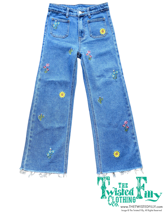 Blue denim jeans with floral embroidery detail