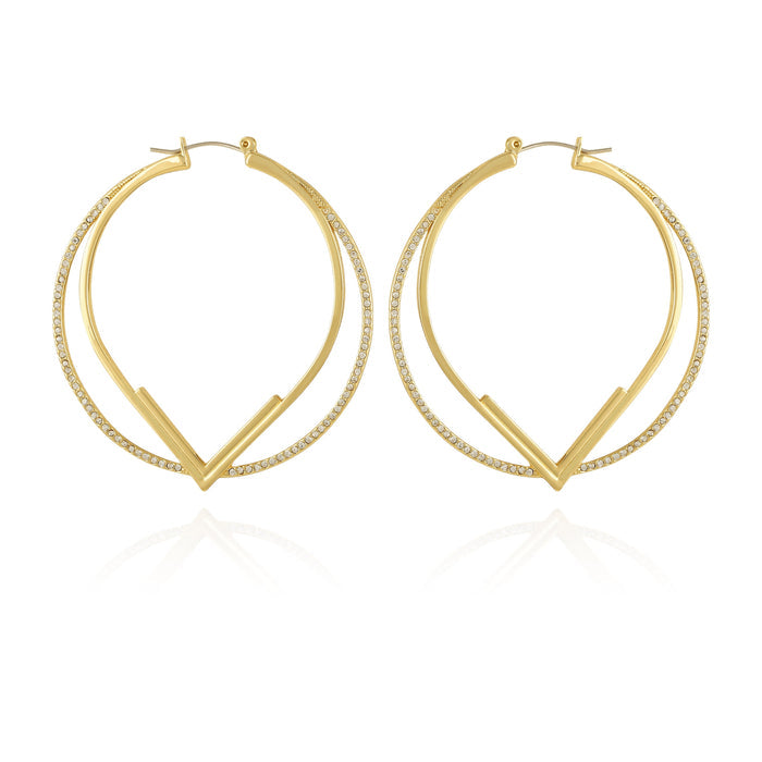 The Vince Camuto Double Hoop V Pave Earrings feature a gold V-shaped design with a thinner pave hoop accented by clear stones on the outer edge, all elegantly showcased against a white background.