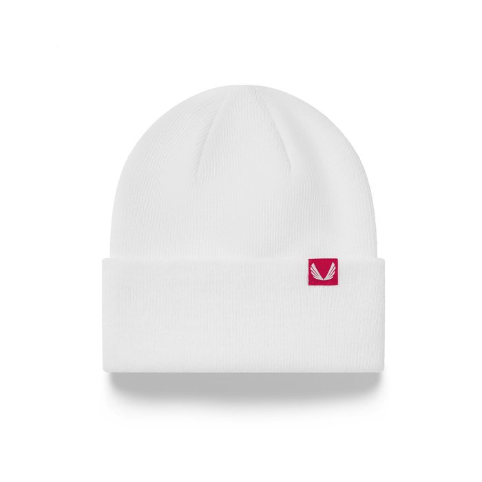 flatlay Essential Beanie in white, front view with pink logo patch
