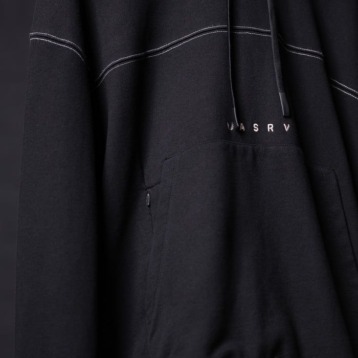 FA'20 Contrast Thread Hoodie in black with white stitching detail, draped fabric closeup