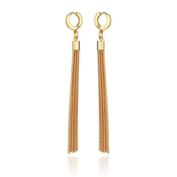 The Goldtone Huggie Tassel Hoop Drop Earrings by Vince Camuto feature sleek hoops with long, slender gold chain tassel pendants hanging from each huggie, all showcased on a white background—an elegant and trendy accessory that adds a touch of sophistication to any outfit.