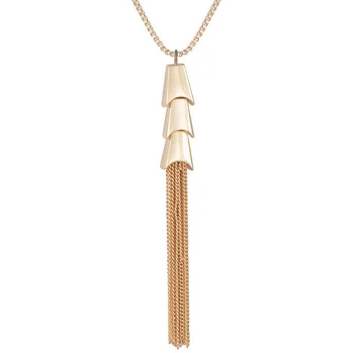 Elevate any look with the Vince Camuto Goldtone Long Tassel Chain Necklace, featuring a tiered geometric top and long tassel fringe elegantly designed on a delicate box chain.