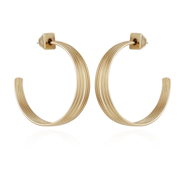 A pair of Goldtone Open Stacked Hoop Earrings by Vince Camuto, featuring a large, ridged design with squared backs, displayed against a white background—an elegant addition to any jewelry collection.