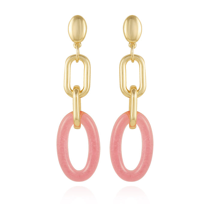 Introducing the Vince Camuto Goldtone Pink Candy Interlocking Drop Earrings, featuring oval studs, elongated chain links, and large pink oval hoops at the bottom. These chic earrings make a standout addition to any jewelry collection and are beautifully displayed on a white background.