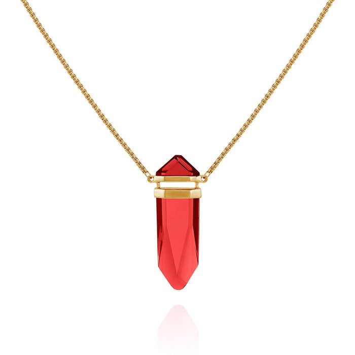 The Vince Camuto Goldtone Red Crystal-Shape Stone Pendant Long Necklace features a dazzling faceted red stone accented by gold bands, displayed on a white background—a striking statement piece with a long box chain for added elegance.