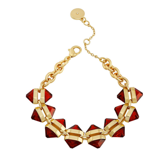 Introducing the Goldtone Red Stone Cable Chain Bracelet by Vince Camuto—a chic accessory showcasing geometric red resin stone accents along a gleaming gold cable chain. Designed with a secure lobster clasp, the bracelet also features an adjustable extender chain adorned with a round gold charm at the end.