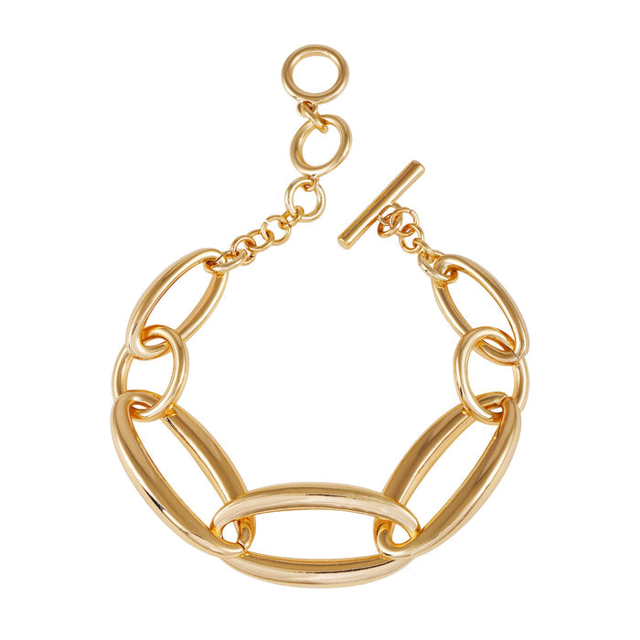 The Vince Camuto Goldtone Toggle Bracelet features large oval links and a sleek toggle clasp, beautifully displayed against a white background.