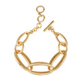 The Vince Camuto Goldtone Toggle Bracelet features large oval links and a sleek toggle clasp, beautifully displayed against a white background.