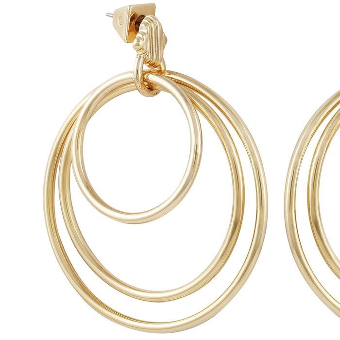 Close-up of the Vince Camuto Goldtone Triple Layered Hoop Drop Earrings, featuring three interconnected circular hoops in varying sizes attached to a gold stud backing—perfect statement earrings for any occasion.