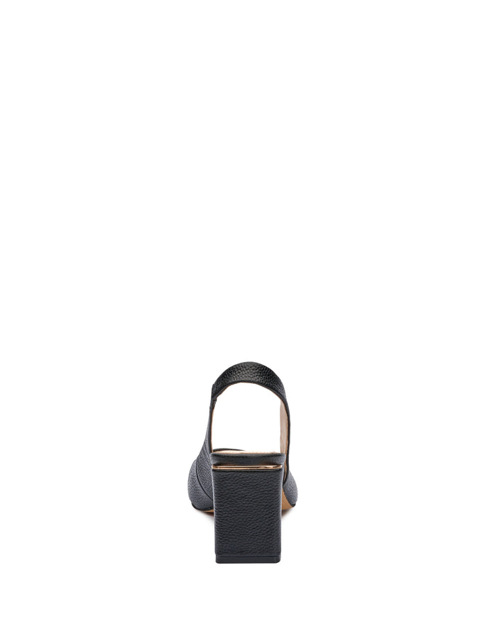 The Hamden Slingback by Vince Camuto is displayed from the back against a white background, highlighting its black leather construction, block heel, pointed-toe pump silhouette, and ankle slingback strap.
