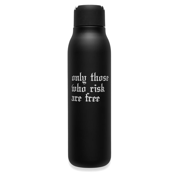 Flatlay of black insulated water bottle with 'only those who risk are free' text, front view