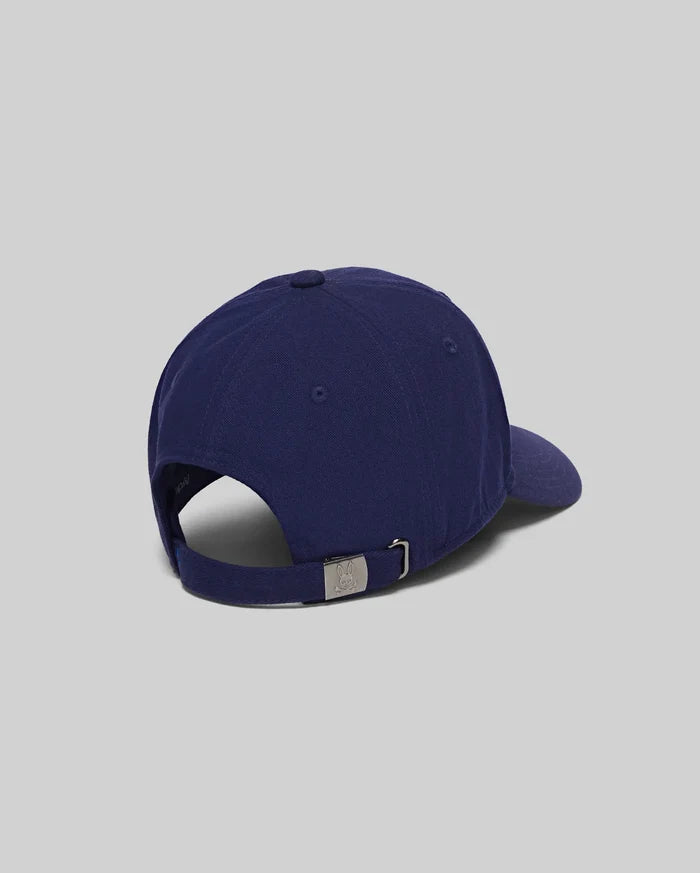 Mens Jimmy Baseball Cap in navy cotton twill, featuring an adjustable strap with a silver Psycho Bunny skull logo buckle at the back.