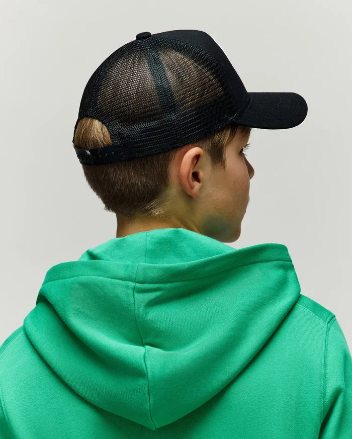 Black KIDS ADAMO TRUCKER CAP with a breathable mesh back and adjustable snap closure, worn with a vibrant green classic fit hooded sweatshirt in a soft, comfortable jersey fabric.