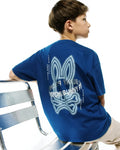 Kids Alex Relaxed Back Graphic Tee in royal blue jersey knit, featuring a large, light blue and white halftone Psycho Bunny skull logo graphic on the back, flanked by vertical Psycho Bunny text.