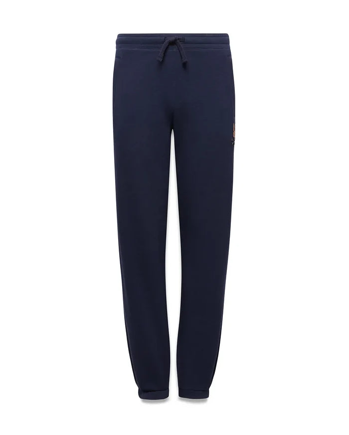 Kids Darcy Sweatpant in navy, featuring a relaxed fit, smooth jersey knit, drawstring waist, and a small, multi-color embroidered Psycho Bunny skull logo on the upper right thigh.