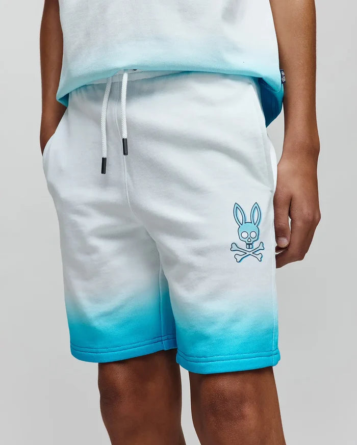 Kids Dax Sweatshort in soft french terry, featuring a white to blue ombre fade, relaxed fit, drawstring waist, and a large blue Psycho Bunny skull logo on the left thigh.