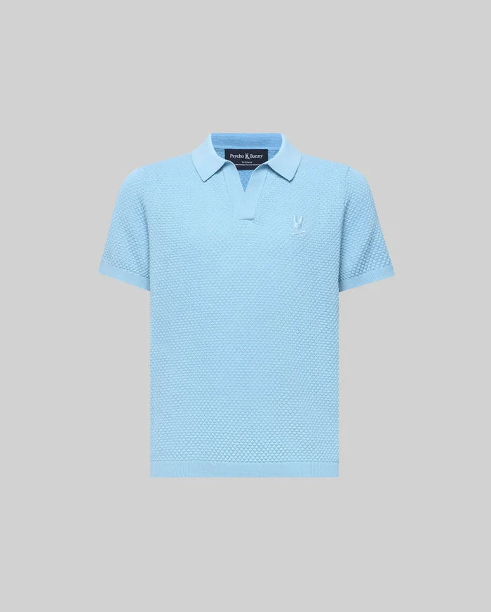 Kids Devon Bubble Stitch Knit Polo in light blue, featuring a textured bubble stitch knit fabric, an open placket, and a small, tonal embroidered Psycho Bunny skull logo on the left chest.