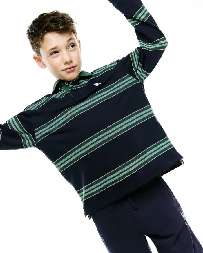 Kids Drew Striped L/S Pique Polo in classic fit navy blue pique, featuring long sleeves, a green collar, two-button placket, horizontal green and white stripes, and a small embroidered Psycho Bunny skull logo on the left chest.