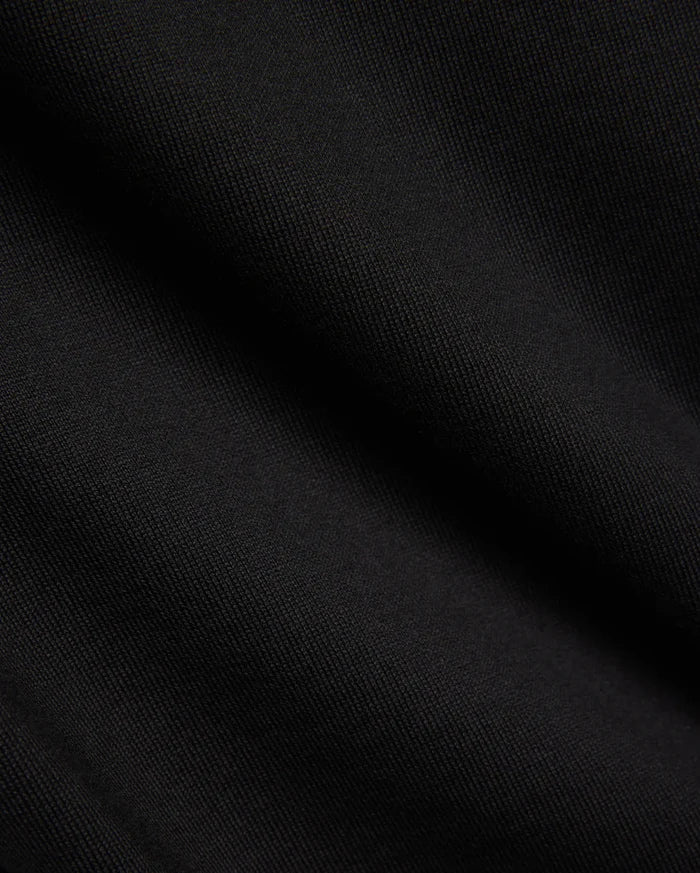 Kids Duncan Relaxed Fit Tee, a premium black jersey tee featuring a soft, finely woven texture, embodying Psycho Bunny's refined streetwear comfort.