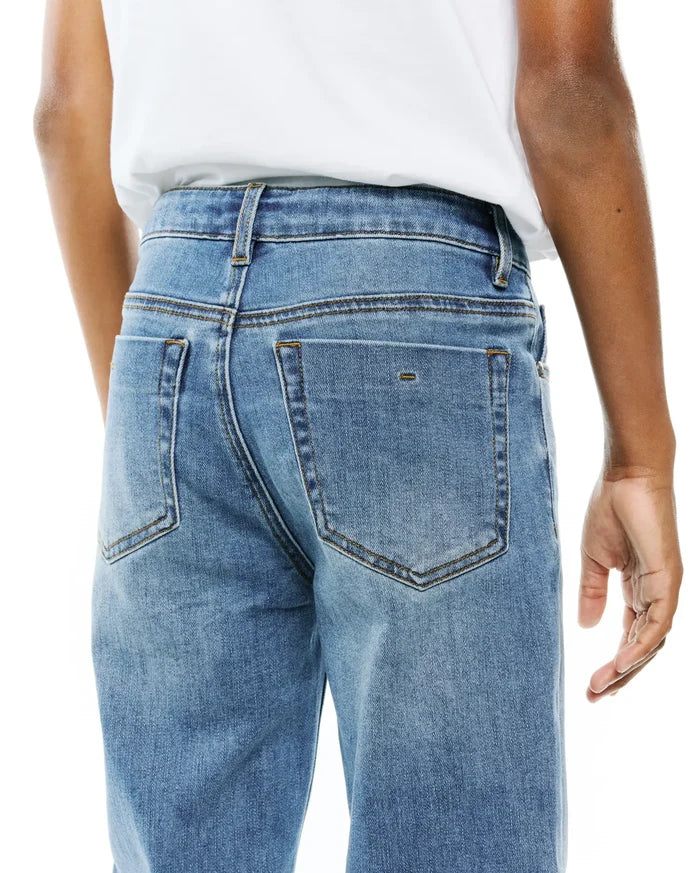 Kids Emerson Denim Pant, light blue classic fit denim with faded wash, brown contrast stitching, and a small embroidered horizontal bar on the right back pocket.