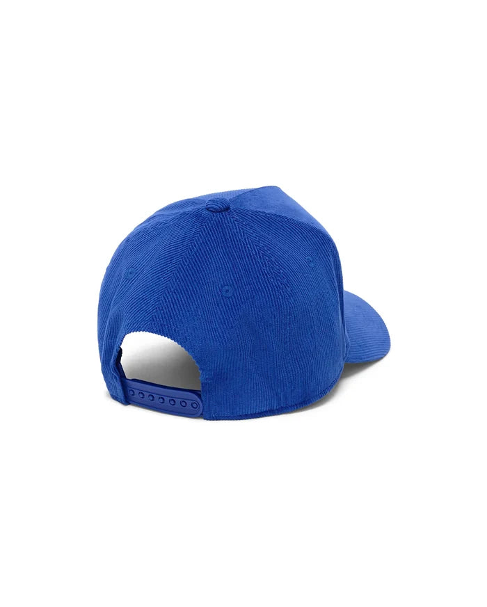 Kids Finnley Bunny Corduroy Trucker Cap in vibrant royal blue, showcasing its distinct ribbed corduroy texture and a functional adjustable snapback closure at the rear.