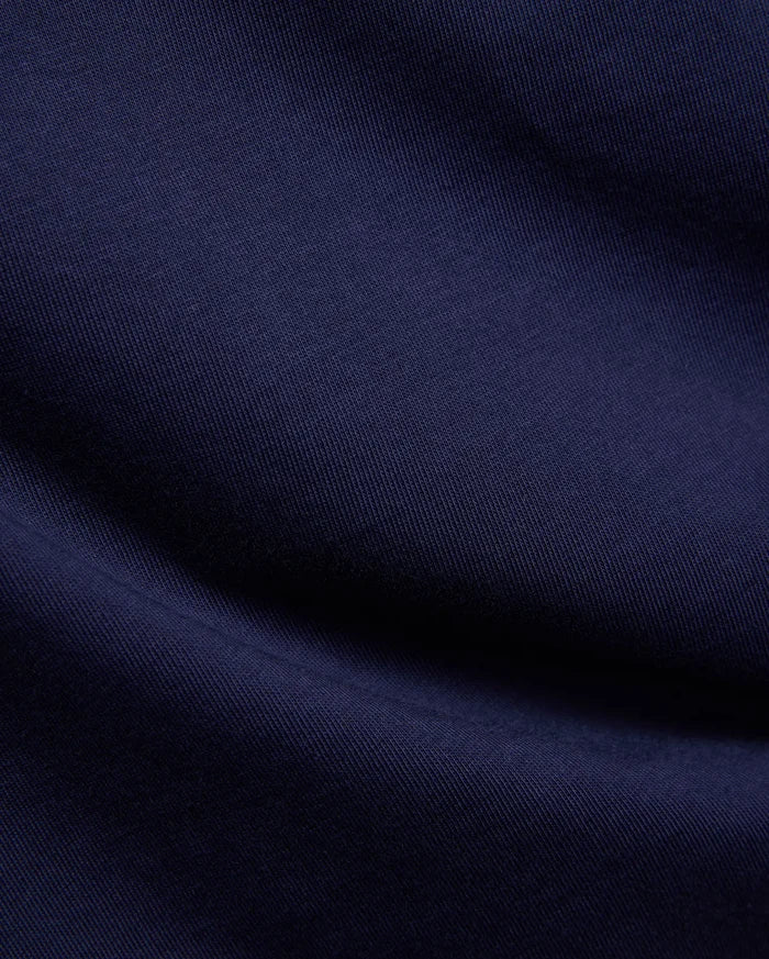 Kids Frank Back Graphic Tee in rich navy blue, crafted from soft, finely woven jersey fabric, featuring the iconic Psycho Bunny skull logo and a bold back graphic.
