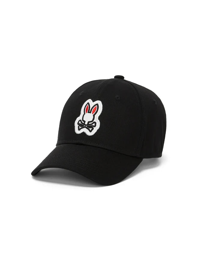 Black Kids Jaydon Baseball Cap with a prominent embroidered white and red Psycho Bunny skull and crossbones logo centered on the front, featuring a classic cotton twill texture.