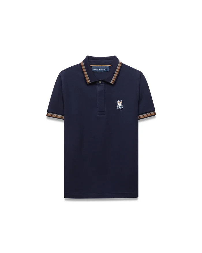 Kids Jaydon Pique Polo in navy, featuring a classic fit and pique texture. It has orange, brown, and white striped collar and cuffs, with a small embroidered Psycho Bunny skull logo on the left chest.