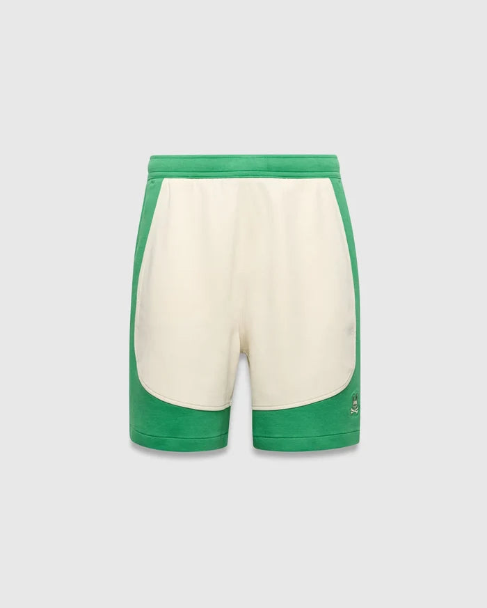 Kids Kelly Short, a relaxed fit green and cream color-block short in soft jersey fabric, featuring a small embroidered Psycho Bunny skull logo on the lower right leg.