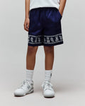 Kids Luke Tencel Short, navy relaxed-fit shorts with a white bandana-style print featuring repeated Psycho Bunny skull logos and paisley patterns along the hem, bordered by Psycho Bunny text.