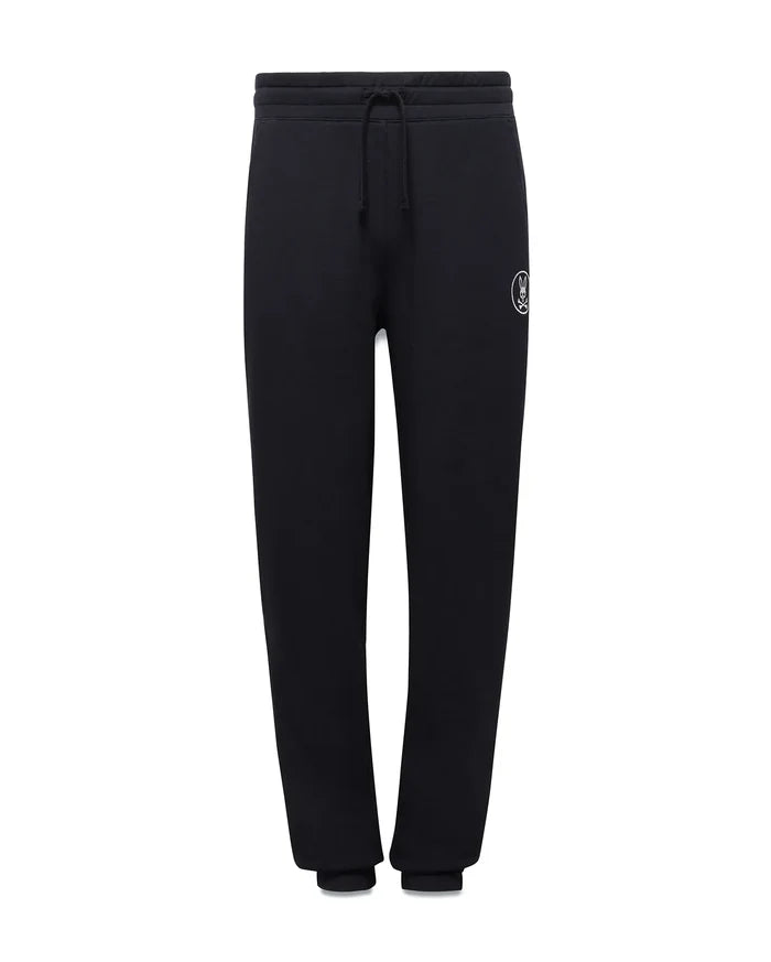 Kids Nathaniel Sweatpant, black french terry, relaxed fit sweatpant with drawstring waist, ribbed cuffs, and a small white embroidered Psycho Bunny skull logo on the left thigh.